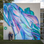 Stunning large-scale 3D murals of iridescent fabrics in movement by Rosie Woods