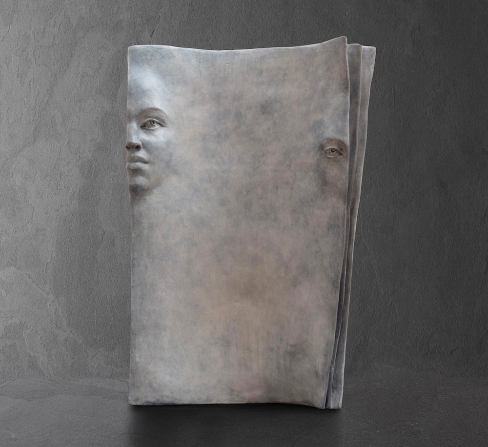 Stunningly Surreal Sculptures Of Human Faces Emerging From Book Pages By Paola Grizi 13