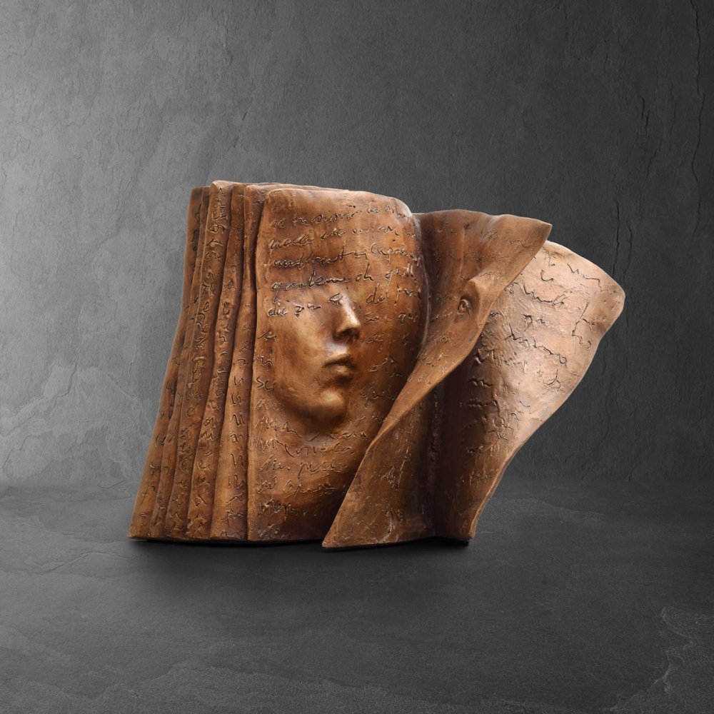 Stunningly Surreal Sculptures Of Human Faces Emerging From Book Pages By Paola Grizi 2
