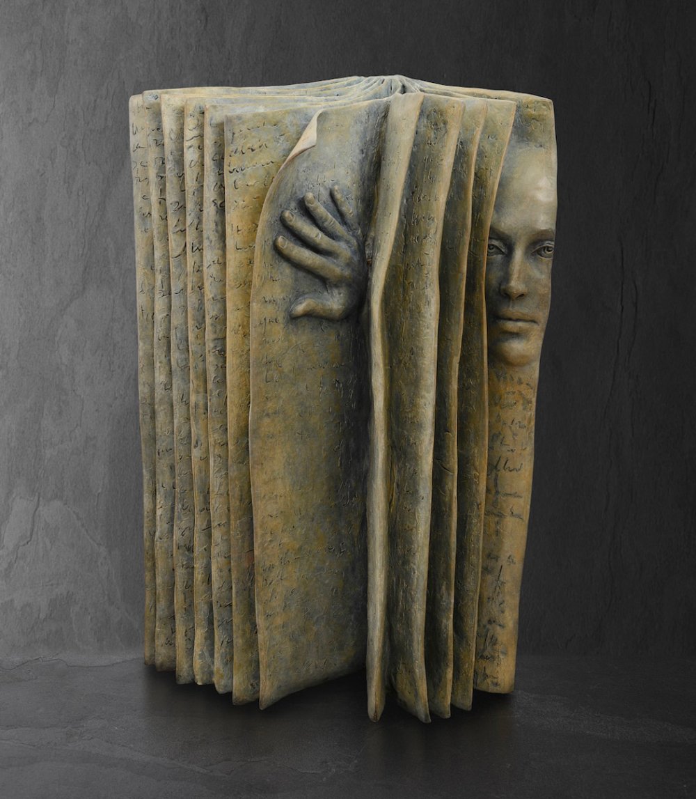 Stunningly Surreal Sculptures Of Human Faces Emerging From Book Pages By Paola Grizi 9