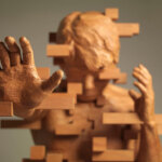 Splendid wood sculptures of pixelated figures by Hsu Tung Han