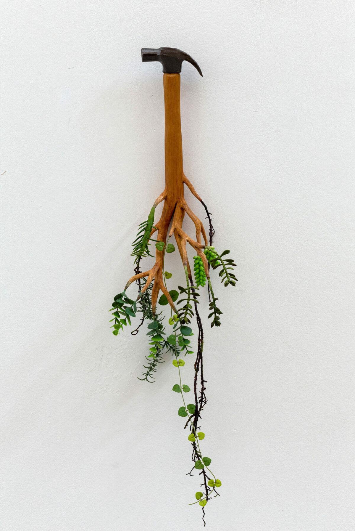 Art And Nature Humorous Wooden Sculptures With Sprouted Wooden Limbs By Camille Kachani 8