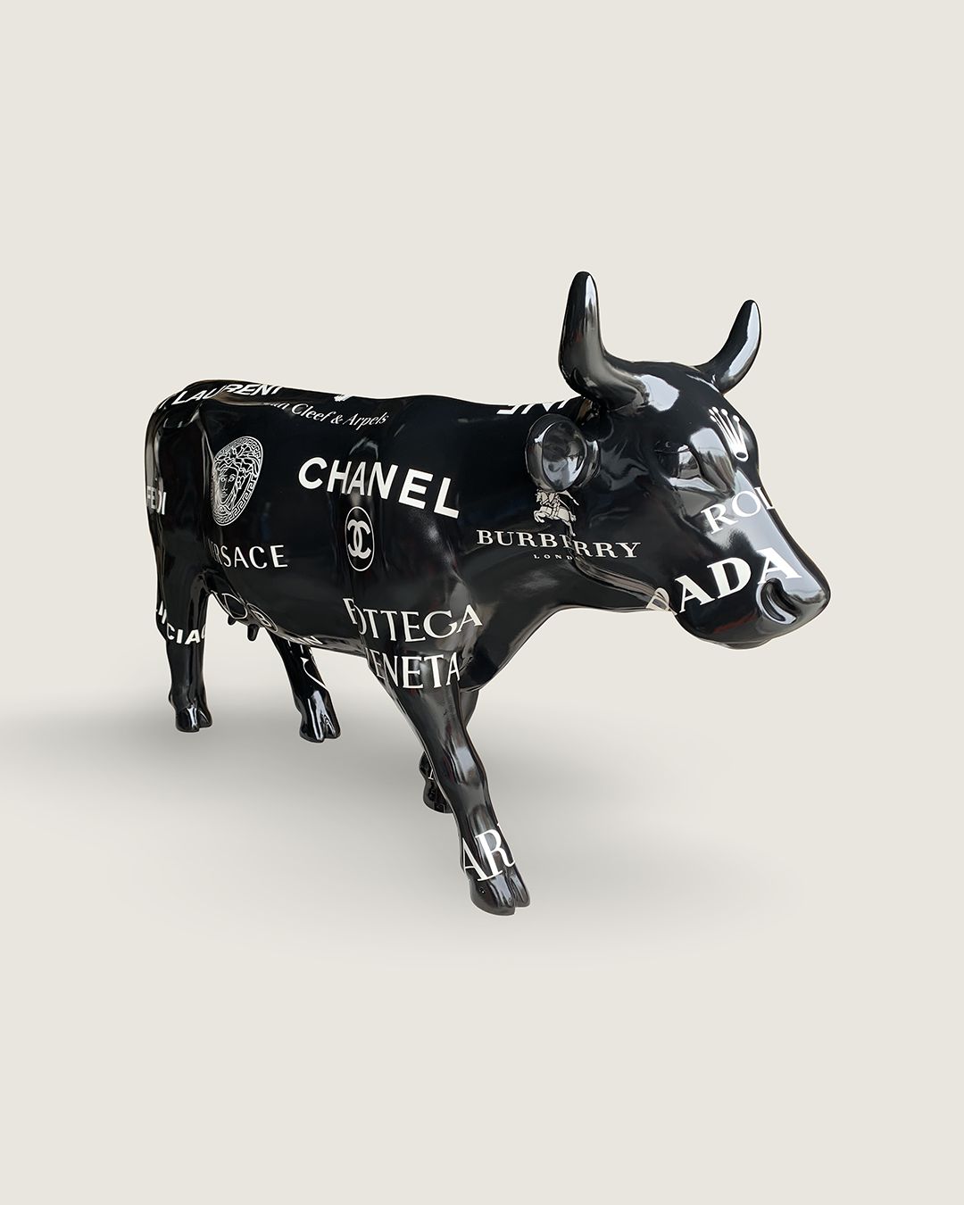 Branded: a fashionable cow sculpture full of symbolism on the modern iconography by Paula Crown
