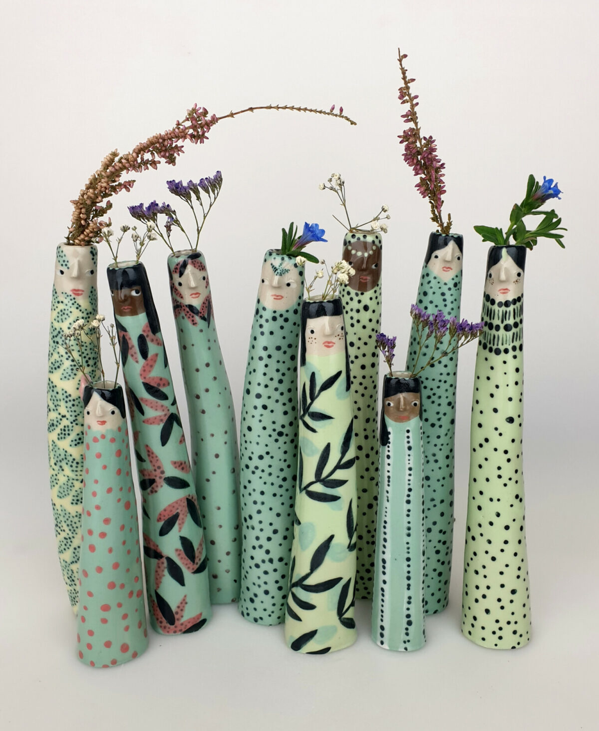 Lovely Porcelain Pieces Patterned With Quirky Cartoon Like Figures By Sandra Apperloo 4