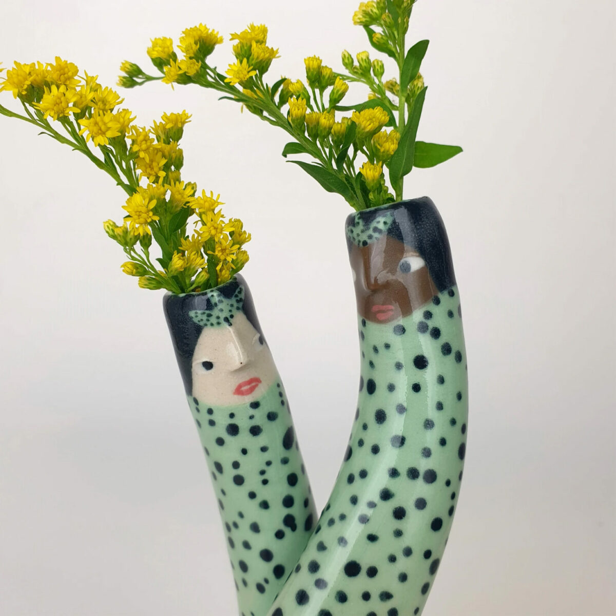 Lovely Porcelain Pieces Patterned With Quirky Cartoon Like Figures By Sandra Apperloo 7