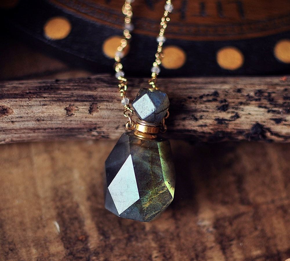 Gorgeous witch’s potion bottle necklaces by Elithien