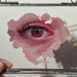 Realistic paintings of eyes and mouths on glass by Henrik Uldalen