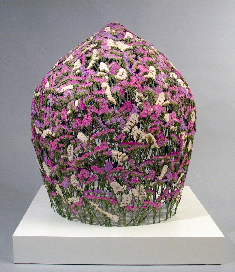 Delicate vessels made of pressed flowers by Ignacio Canales Aracil