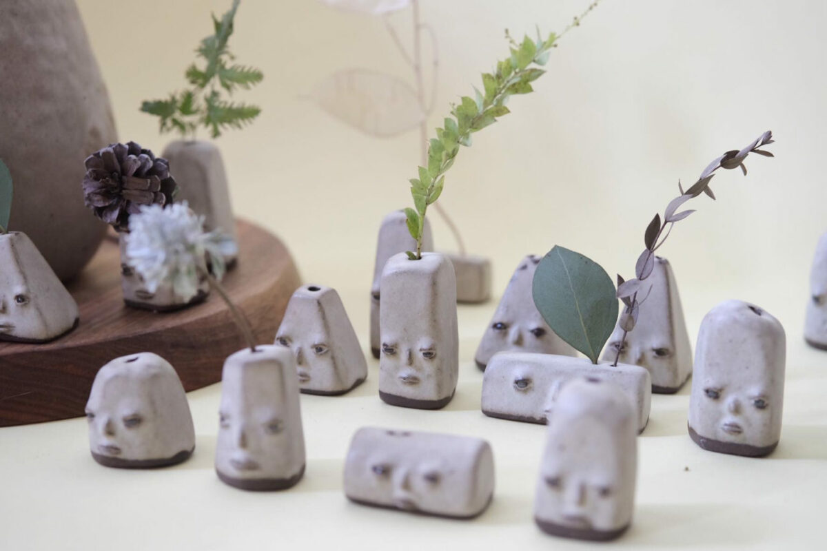 Emotive Little Faces Emerging From Minimalist Ceramics By Fan Yanting 5