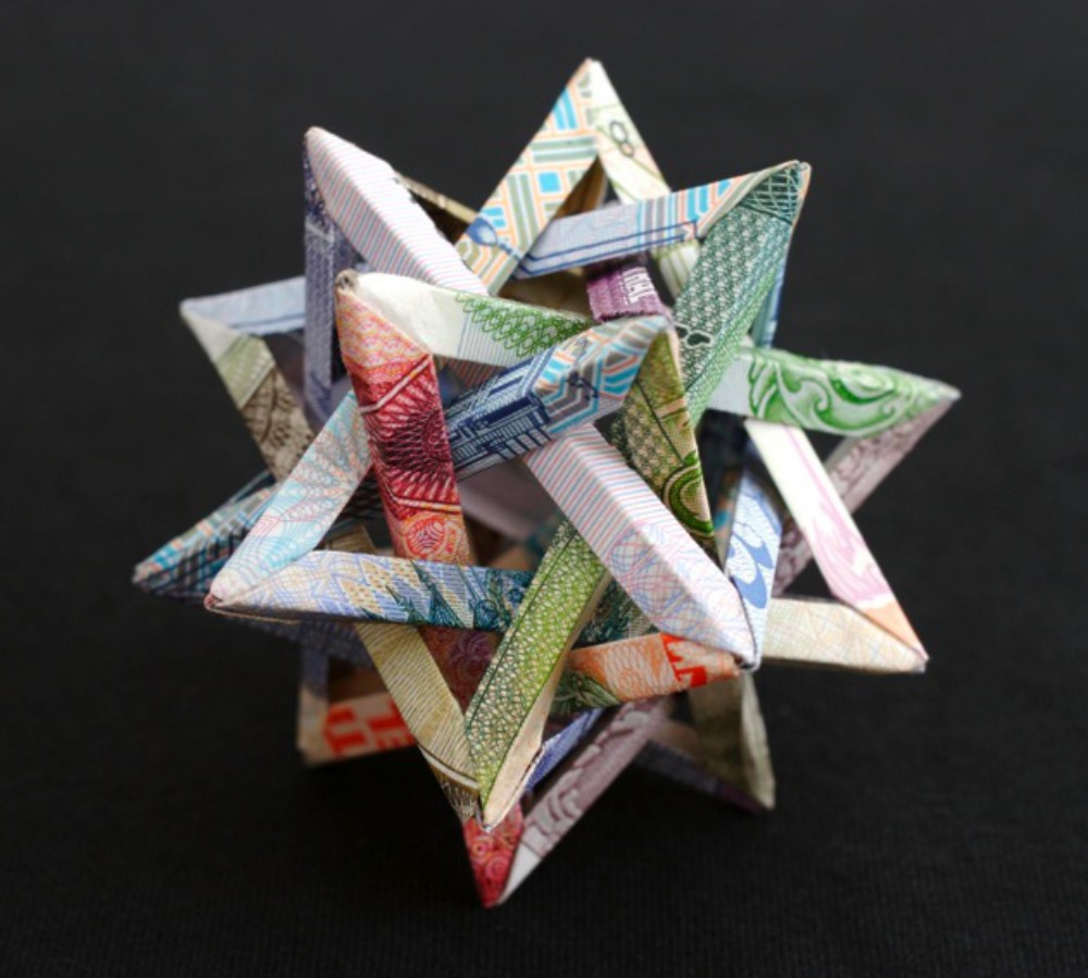 Striking geometric currency sculptures by Kristi Malakoff
