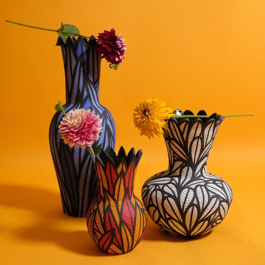 Vibrant art pieces that fuse ceramic vessels with drawings by Ariana Heinzman
