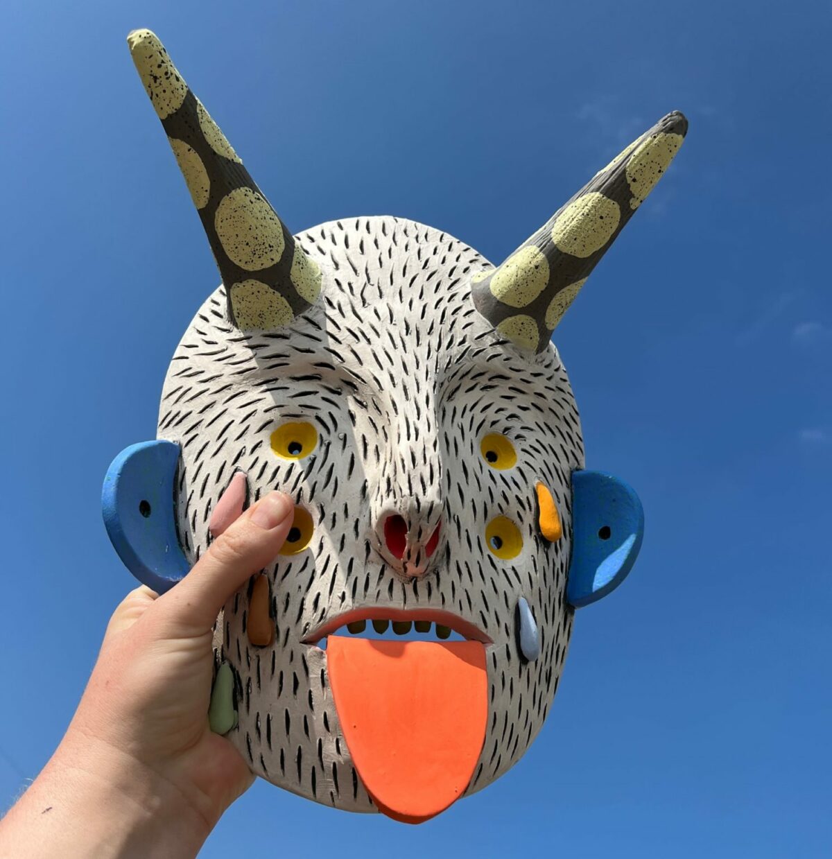 Beautiful ceramic masks of peculiar creatures by Karolina Romanowska