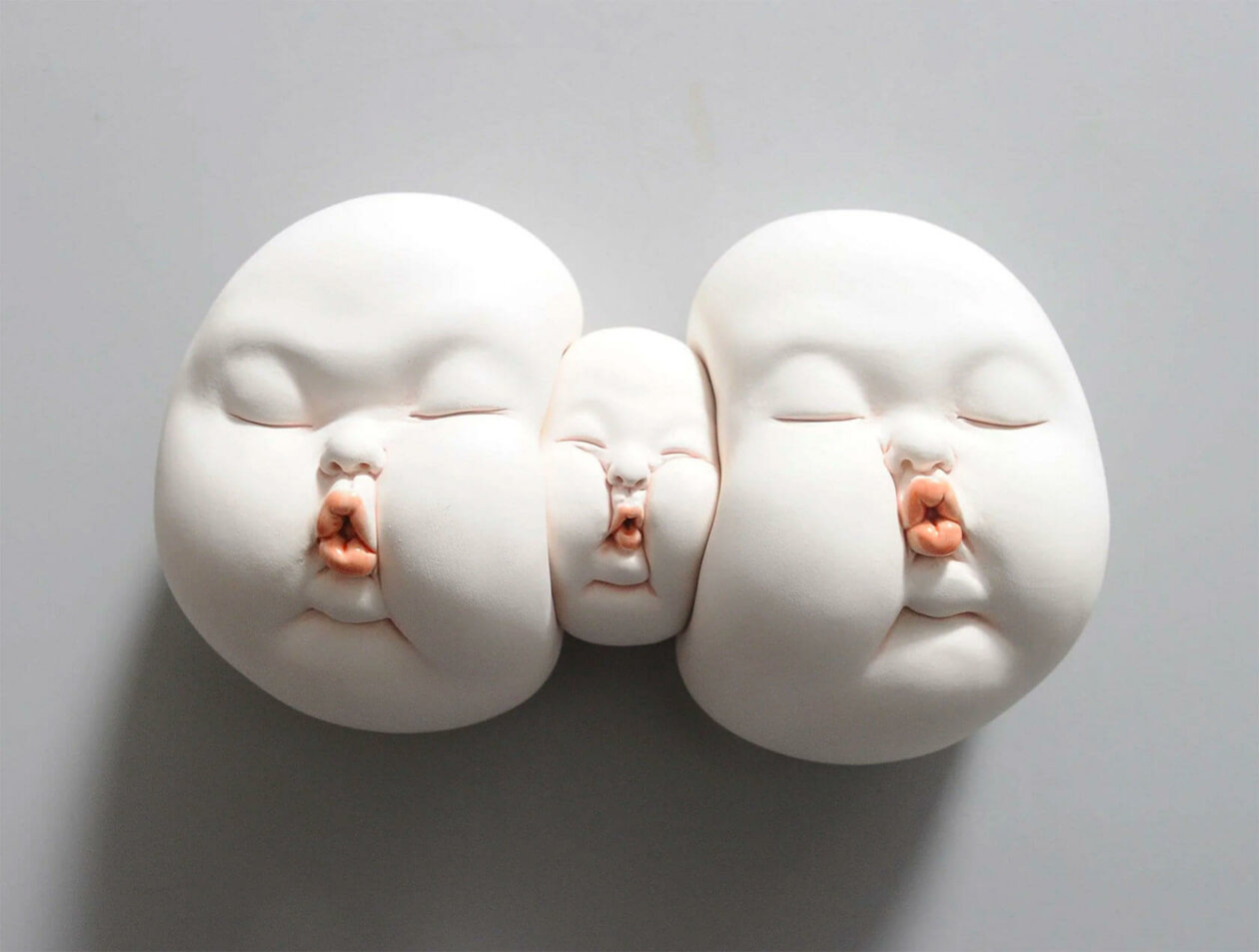 Distorted Baby Faces, Surreal Ceramic Sculptures By Johnson Tsang (14)