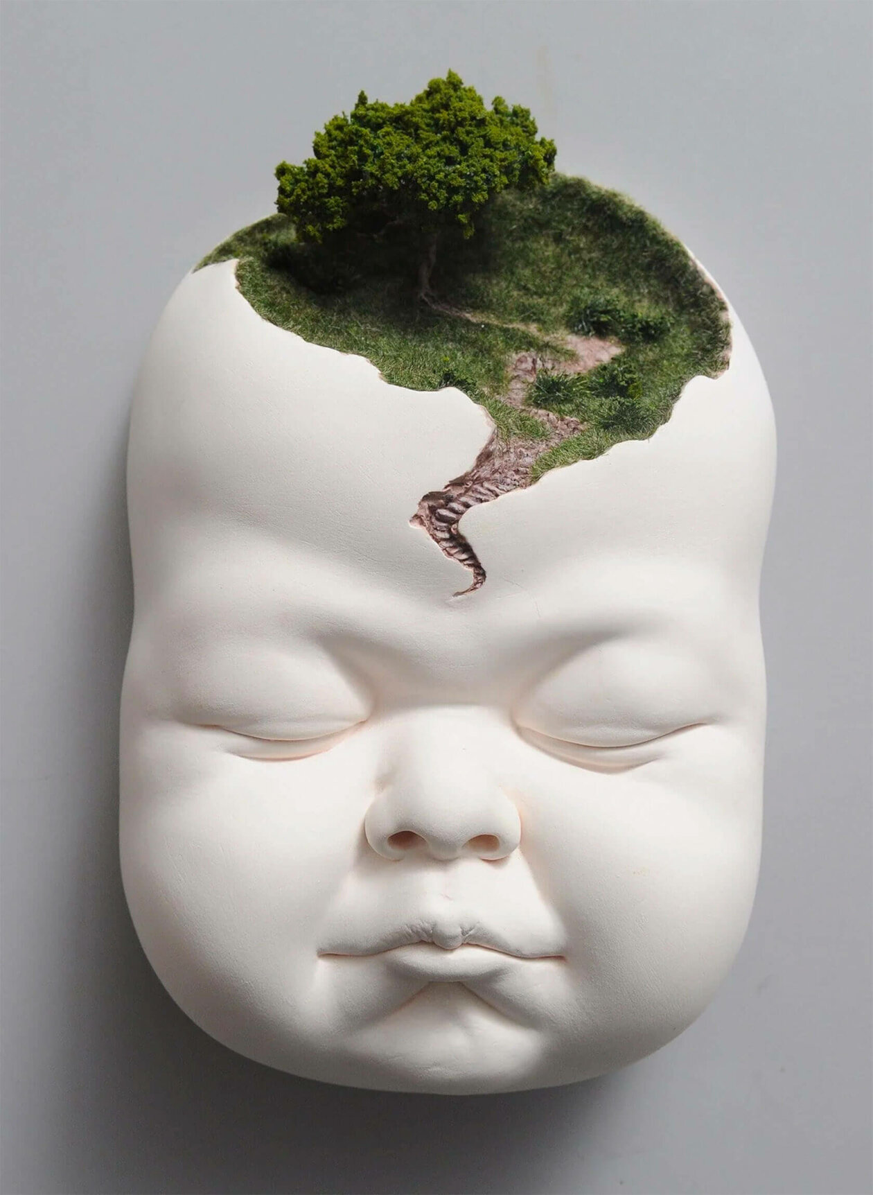 Distorted Baby Faces, Surreal Ceramic Sculptures By Johnson Tsang (21)