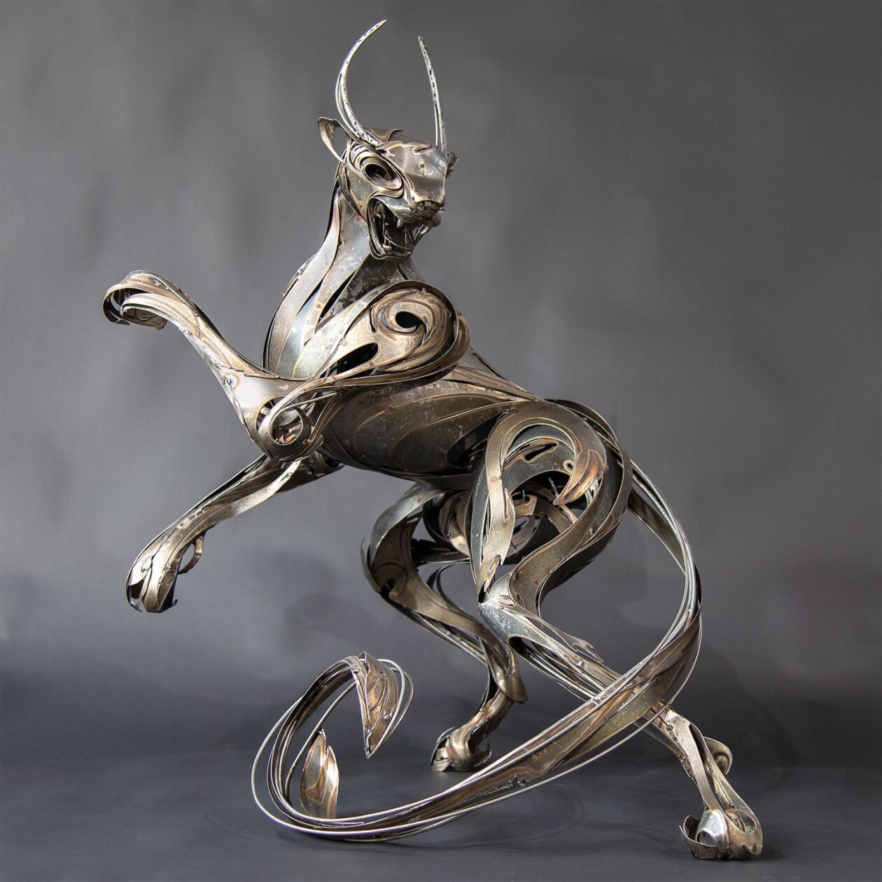 Magnificent Metallic Animal Sculptures Made With Sweeping Lines By Georgie Seccull (20)