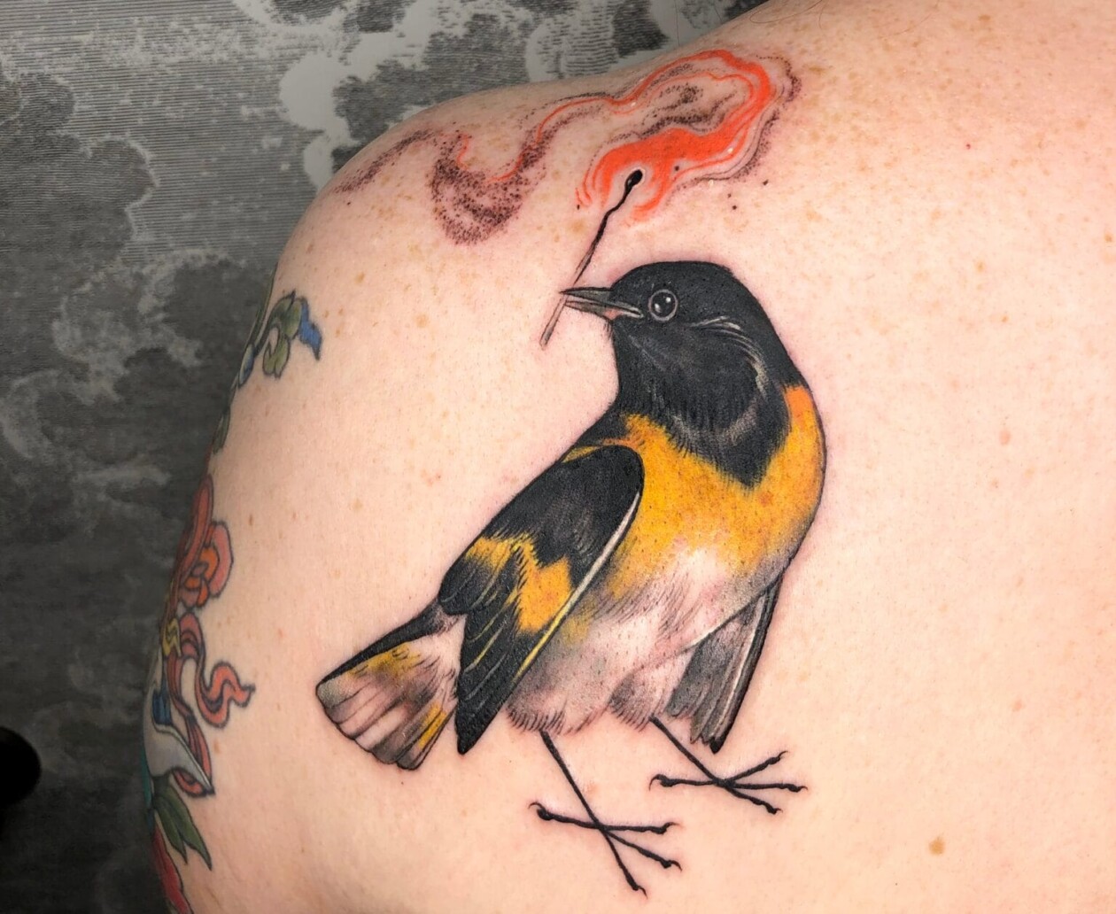 Stephanie Brown Creates Whimsical Tattoos Of Birds Holding A Lit Match Symbolizing Hope For A Better Future (4)